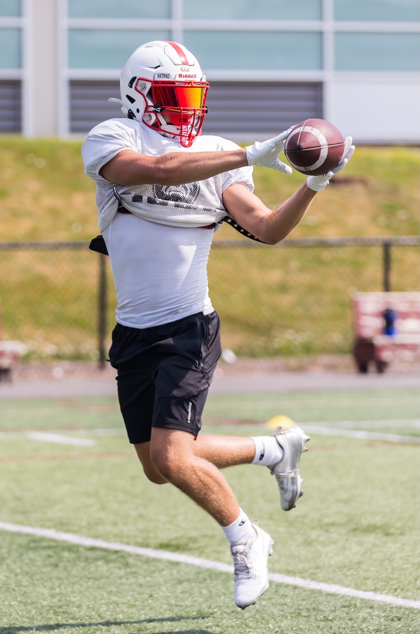 Receiver catching the ball at RAW Sports camp