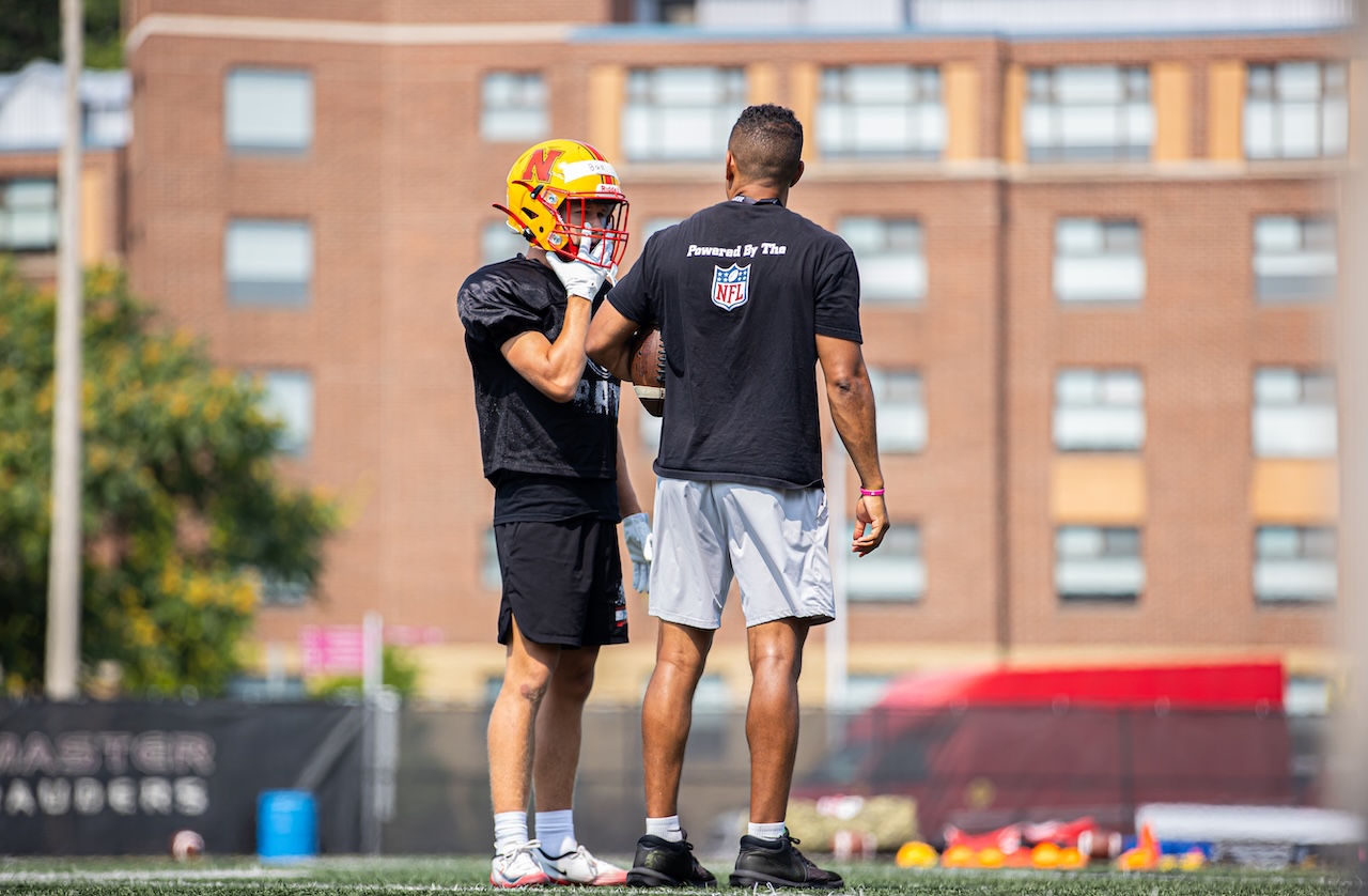 RAW Sports coach coaching up an athlete